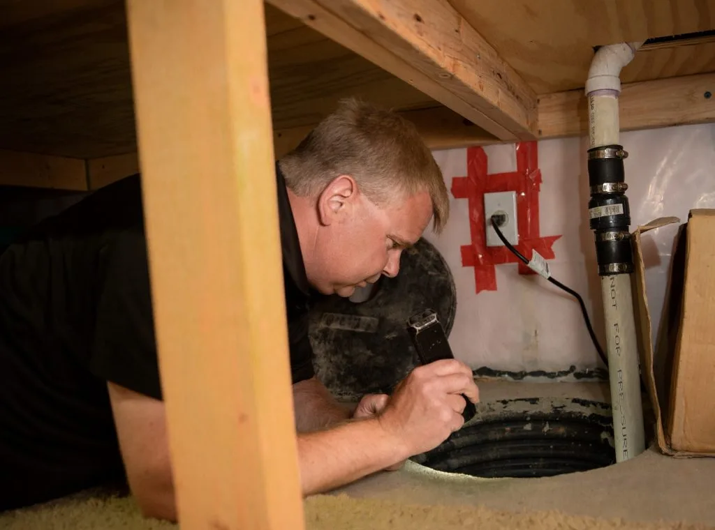 inspector-checking-sump-pit